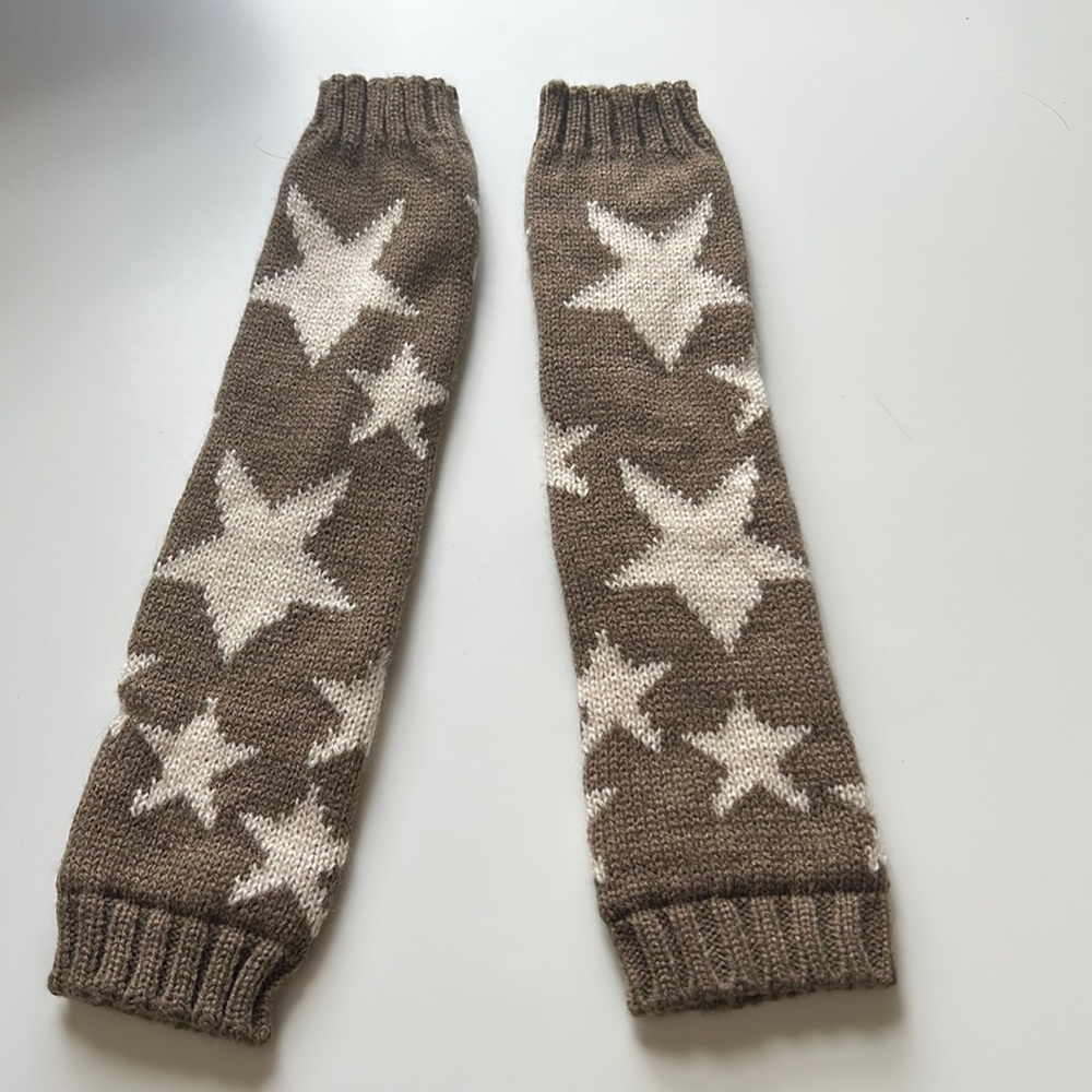 Arm warmers. Star print. Thumb hole. Never worn.